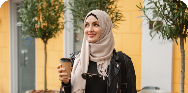 Professional health insurance broker enjoying a coffee on BC city street