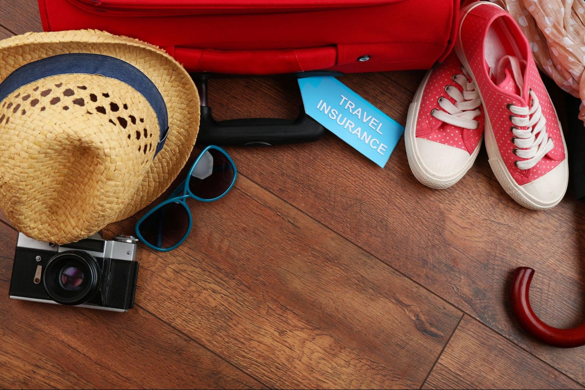 Travel supplies and luggage with "travel insurance" tag