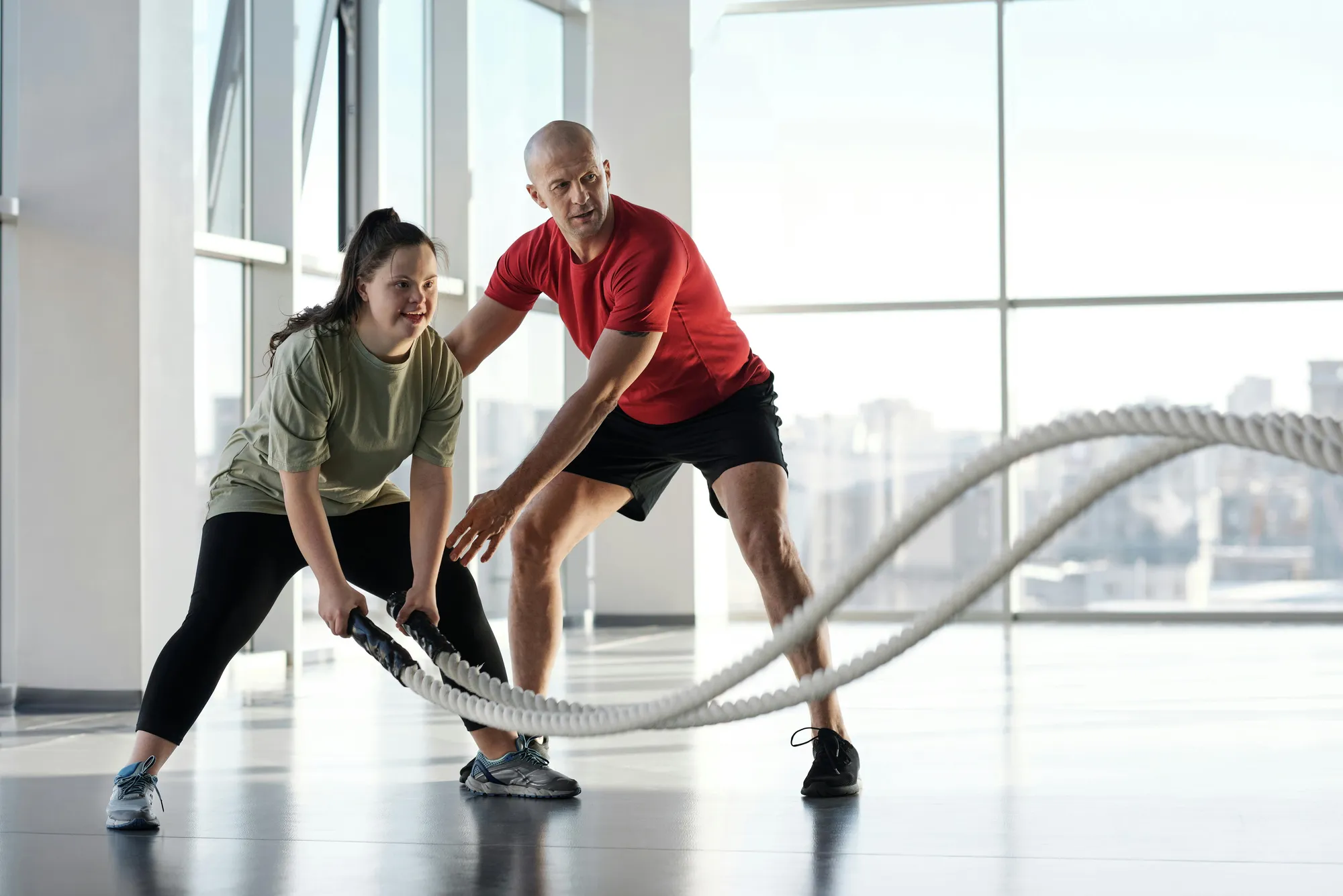 person exercising with a personal trainer 