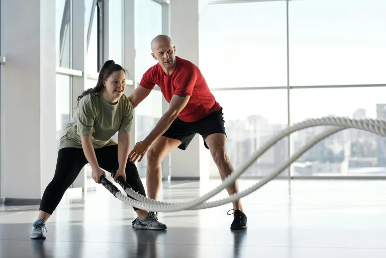 Employee working out with a trainer