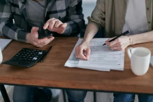 people doing tax paperwork